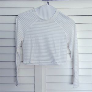 Sheer and opaque white midi top from lululemon.